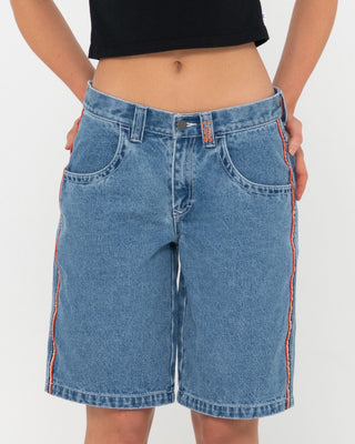 Woman wearing Flip Mommy Low Rise Wide Leg Denim Jort in Middy Blue / Orange