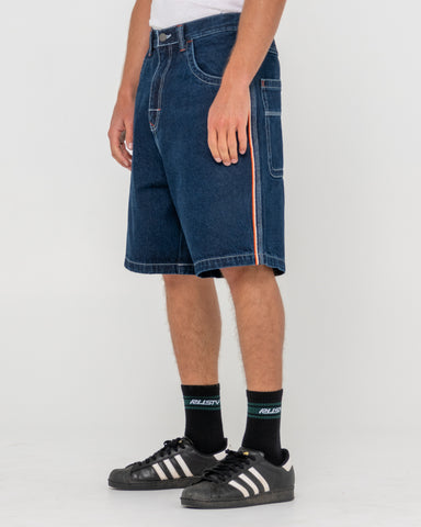 Man wearing Flip Daddy 2.0 Jort - Deep Sea Blue in Blue