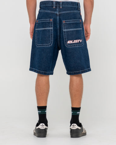 Man wearing Flip Daddy 2.0 Jort - Deep Sea Blue in Blue