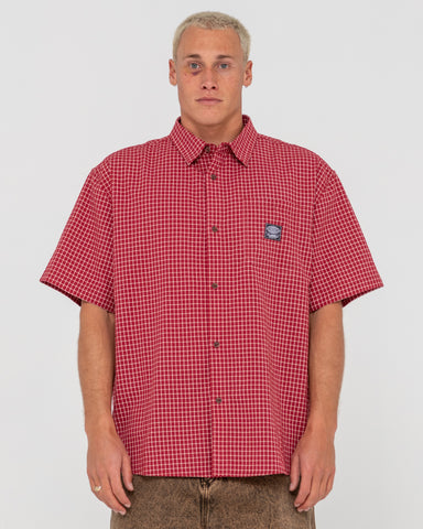 Man wearing Worldwide Curved Hem Short Sleeve Shirt in Red