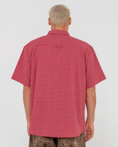 Man wearing Worldwide Curved Hem Short Sleeve Shirt in Red