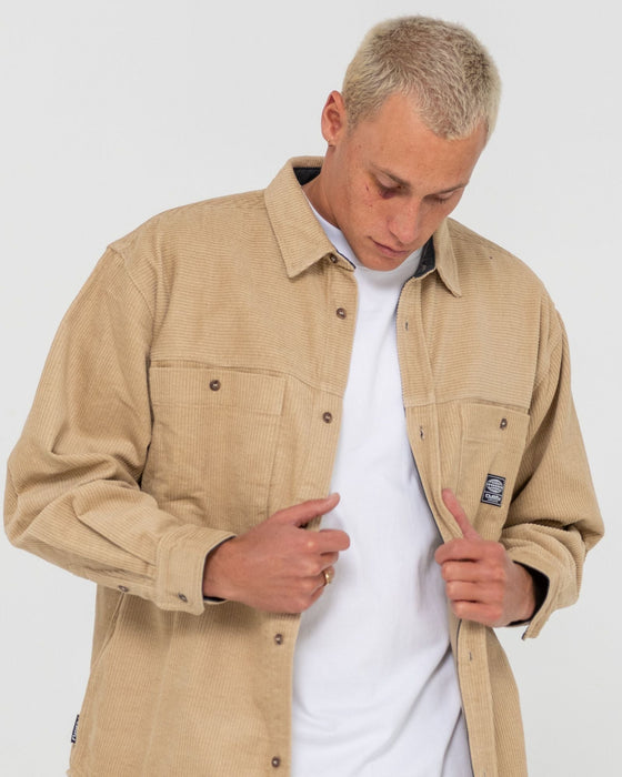 man-wearing-cobra-over-shirt-in-light-fennel