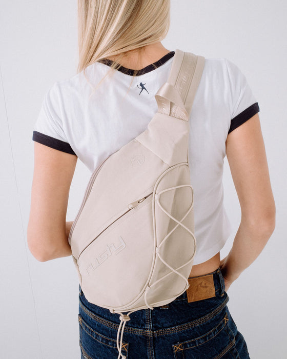 womens-free-run-nylon-sling-backpack-in-oatmeal