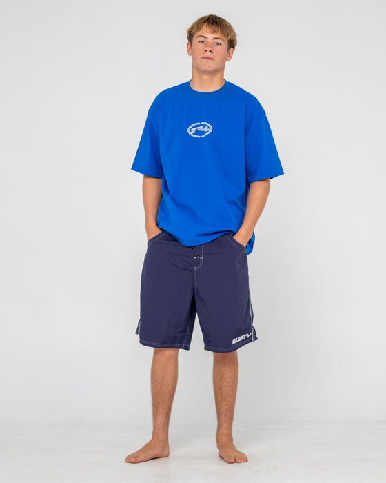 man-wearing-flip-daddy-boardshort-in-navy-blue-2