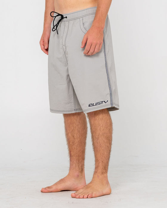 man-wearing-flip-daddy-boardshort-in-stone-grey