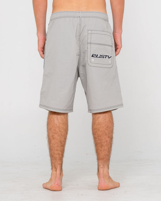man-wearing-flip-daddy-boardshort-in-stone-grey