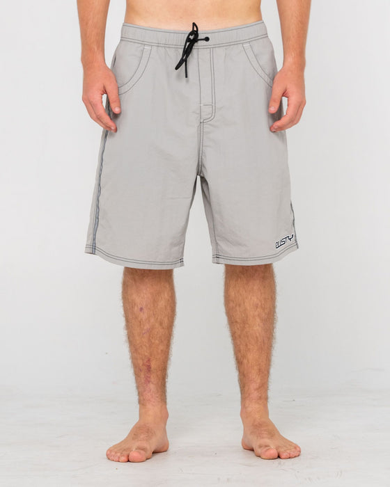 man-wearing-flip-daddy-boardshort-in-stone-grey