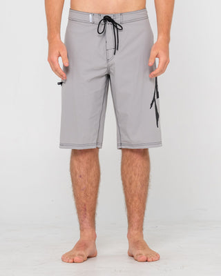 Man wearing Fixed Competition Revolution Boardshort in Stone Grey