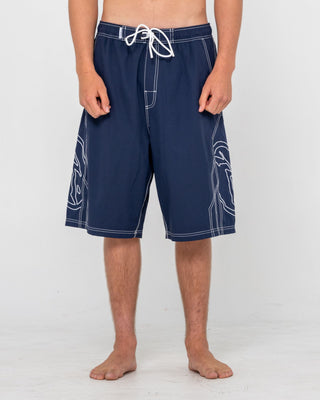 Man wearing Tombstones Hybrid Waist Boardshort in Navy Blue