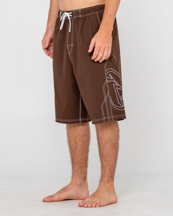 man-wearing-tombstones-hybrid-waist-boardshort-in-pinecone