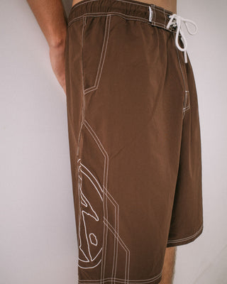 Man wearing Tombstones Hybrid Waist Boardshort in Pinecone