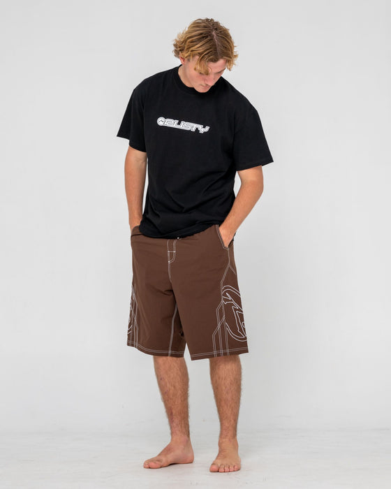 man-wearing-tombstones-hybrid-waist-boardshort-in-pinecone