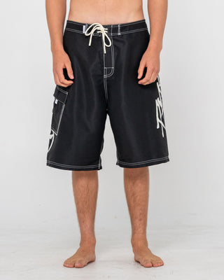 Man wearing Hoodus Fixed Waist Boardshort in Black 2