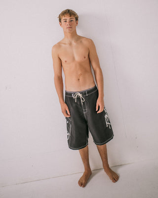 Man wearing Hoodus Fixed Waist Boardshort in Black 2