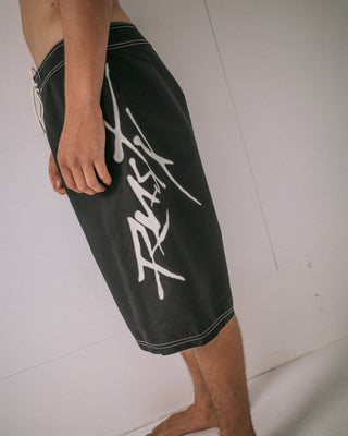 Man wearing Hoodus Fixed Waist Boardshort in Black 2
