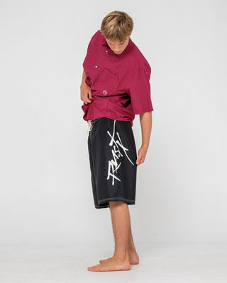 Man wearing Hoodus Fixed Waist Boardshort in Black 2