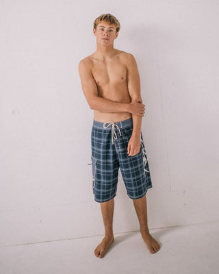 Man wearing Hoodus Fixed Waist Boardshort in Navy Blue 2