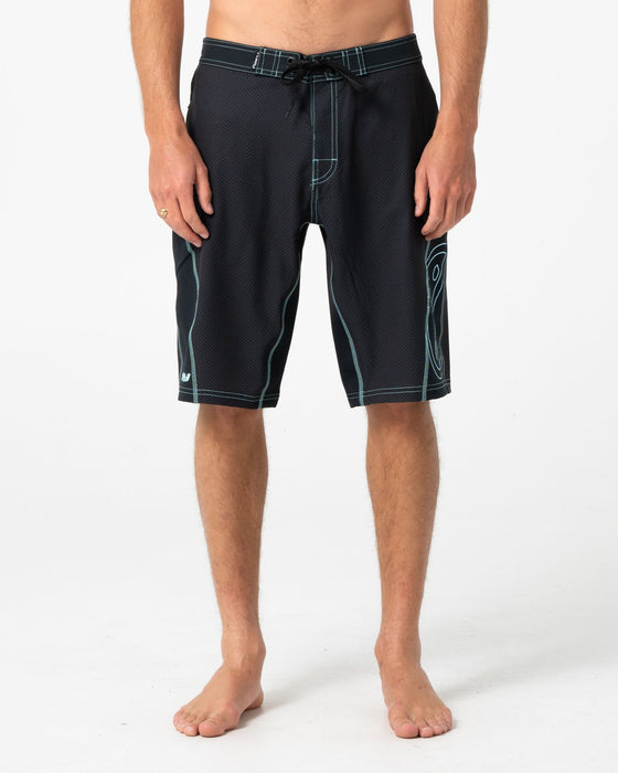 man-wearing-hydro-surge-fixed-waist-boardshort-in-black