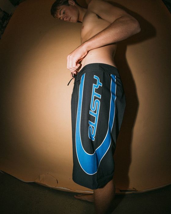 man-wearing-charger-fixed-waist-boardshort-in-black-1