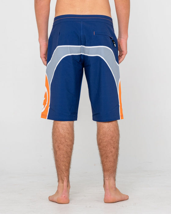 man-wearing-griffin-fixed-waist-boardshort-in-dark-blue