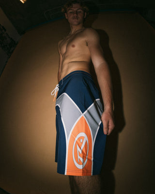 Man wearing Griffin Fixed Waist Boardshort in Dark Blue