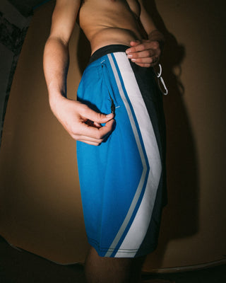 Man wearing Shifter Fixed Waist Boardshort in Black