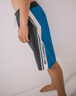 Man wearing Shifter Fixed Waist Boardshort in Black