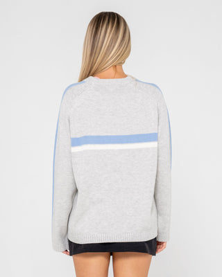 Woman wearing White Lines Long Sleeve Crew Neck Knit in Grey Marle / Blue