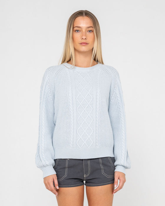 woman-wearing-two-tales-knitted-crew-in-retro-blue