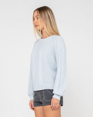 Woman wearing Two Tales Knitted Crew in Retro Blue