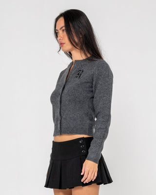 Woman wearing Rusty Academy Cardigan in Charcoal Marle