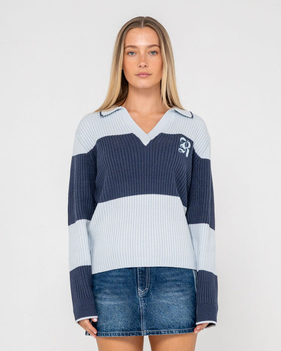 woman-wearing-try-me-knitted-rugby-top-in-retro-blue-navy