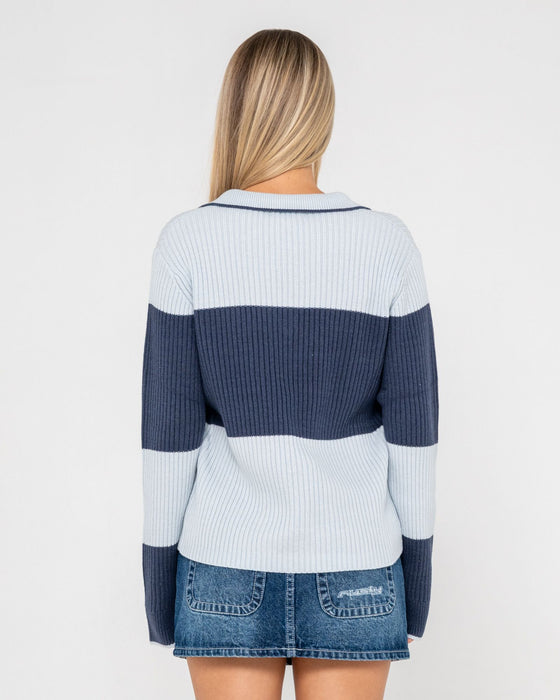 woman-wearing-try-me-knitted-rugby-top-in-retro-blue-navy