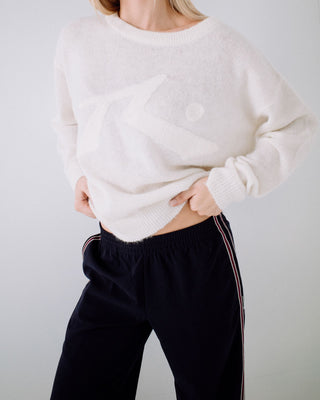 Woman wearing Miles Open Knit Crew in White