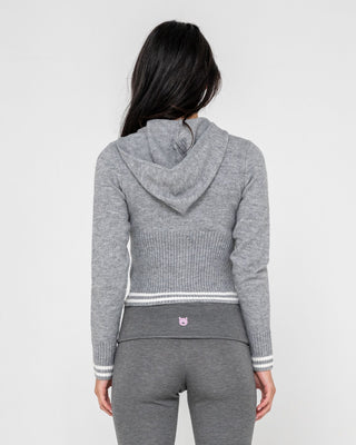 Woman wearing Devil Girl Knitted Zip Through Hood in Grey Marle