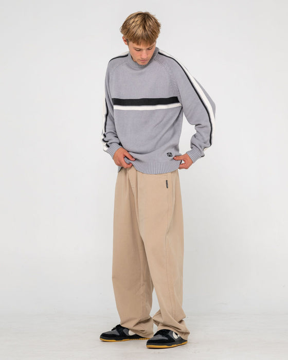 man-wearing-white-lines-2-0-knitted-crew-in-stone-grey