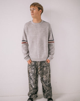 Man wearing Moritz 2.0 Graffiti R Crew Knit Sweater in Grey Marle