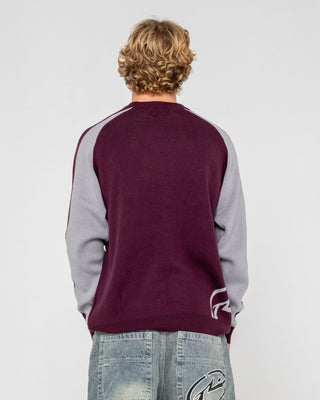 Man wearing Roll Safe Boxy Knitted Crew in Burgundy