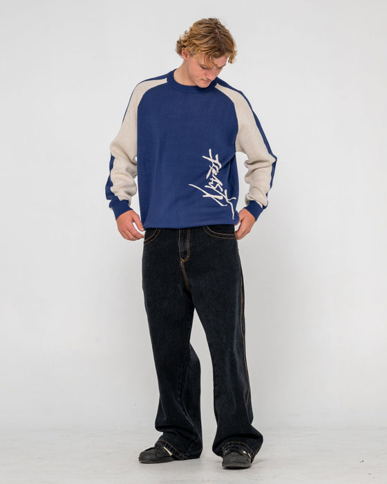 man-wearing-roll-safe-boxy-knitted-crew-in-dark-blue
