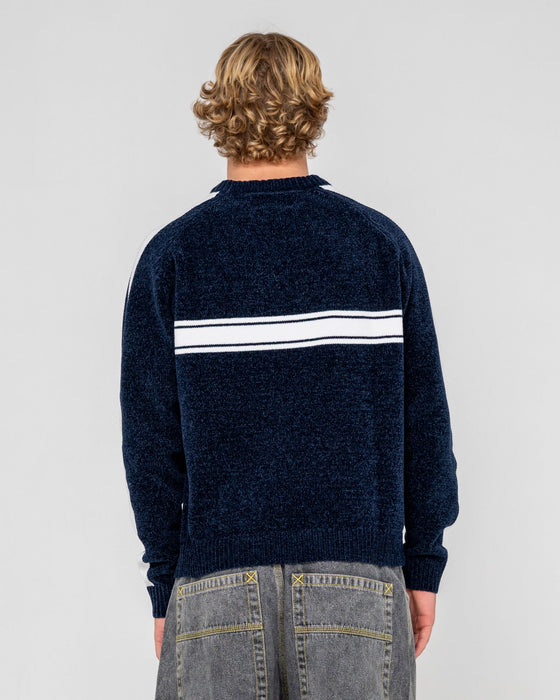 man-wearing-white-lines-chenille-in-dark-blue