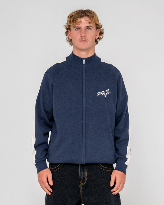 man-wearing-2k-zip-thru-sweater-in-dark-blue