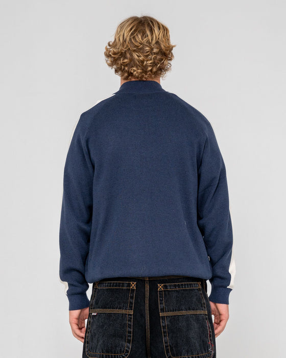 man-wearing-2k-zip-thru-sweater-in-dark-blue