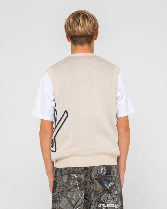 man-wearing-fat-cap-vest-in-cream