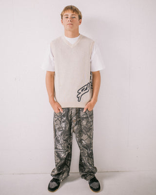 Man wearing Fat Cap Vest in Cream