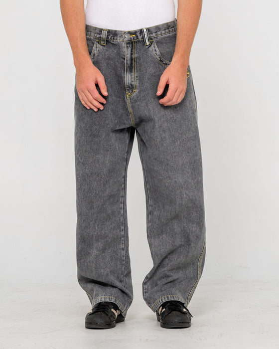 man-wearing-redemption-baggy-jean-in-washed-black-2