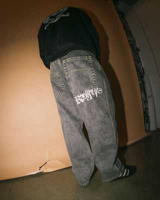 Man wearing Redemption Baggy Jean in Washed Black 2