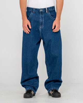 Man wearing Turbo Baggy Jean in Deep Sea Blue