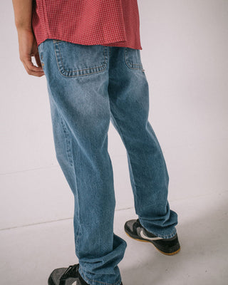 Man wearing Ramone Jean in Blasted Middy Blue