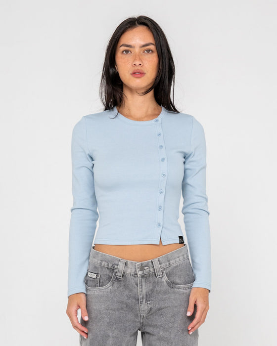 woman-wearing-button-up-long-sleeve-top-in-retro-blue