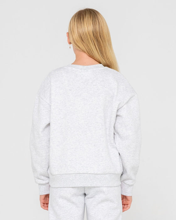 girl-wearing-girls-team-varsity-crew-fleece-in-ecru-marle